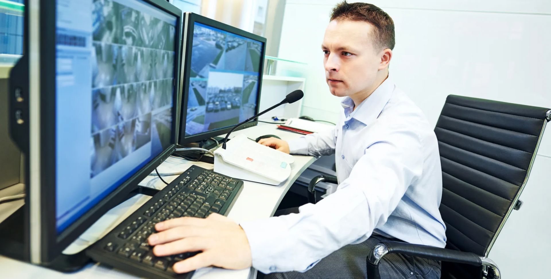 SIBA Mitarbeiter am Security-Desk, Gebäudeüberwachung